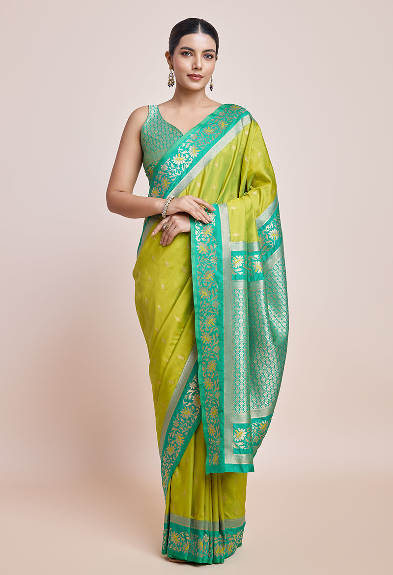 Monjolika Fashion Parrot Green Banarasi Silk In Satin Is Classy Embellished With Golden Zari Work Saree | Swadesiicart