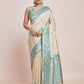 Monjolika Fashion Exquisite Designs With This Cream Banarasi Satin Silk Saree | Swadesiicart
