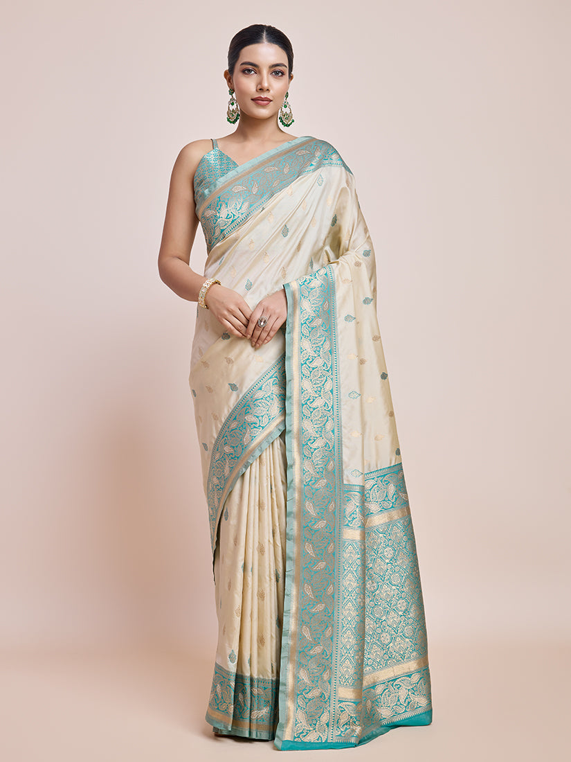 Monjolika Fashion Exquisite Designs With This Cream Banarasi Satin Silk Saree | Swadesiicart