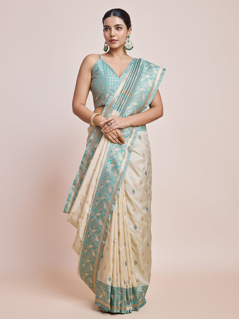 Monjolika Fashion Exquisite Designs With This Cream Banarasi Satin Silk Saree | Swadesiicart