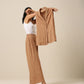 trueBrowns Beige Slub Texture Sleevesless Jacket Pant Set | Swadesiicart