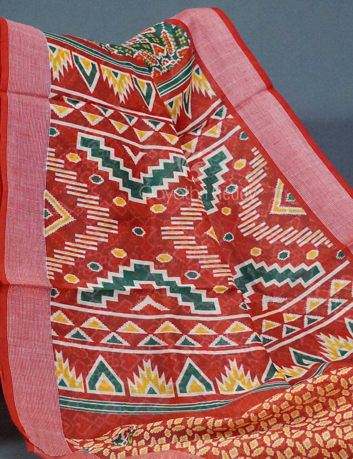 Shades of Navy Parrot Green Colour Patola Print Semi Chanderi Saree By Gayathri Reddy Designer Studio | Swadesiicart