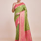 Monjolika Fashion Parrot Green Banarasi Tissue Silk SareeWith Zari Woven Work | Swadesiicart