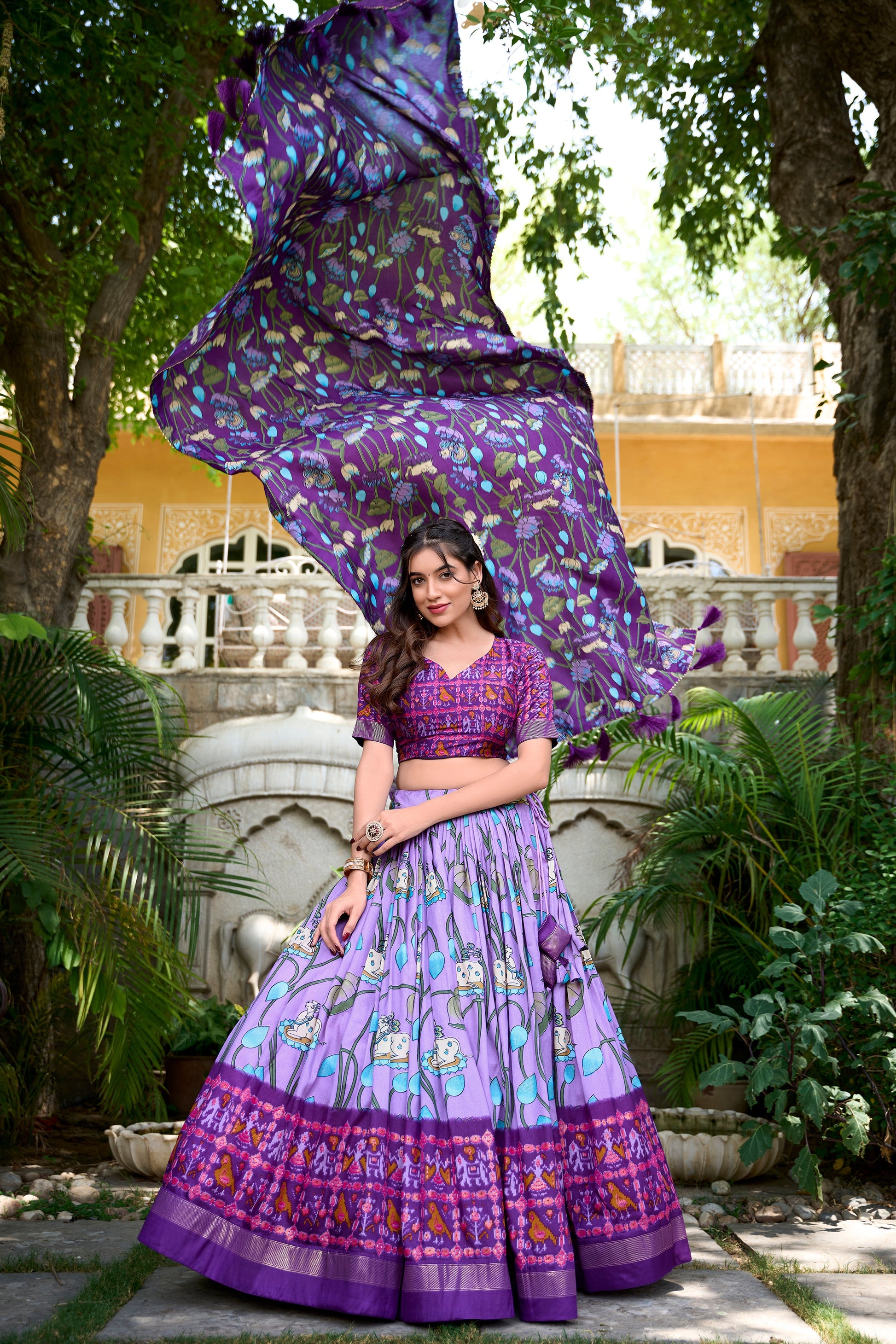 Lorenvalley Lavender Tussar Silk Pichwai With Patola Print And Zari Weaving Border Lehenga Choli with Dupatta | Swadesiicart