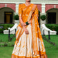 Lorenvalley Cream and Mustard Dola Silk Shibori Print With Zari Weaving Border Lehenga Choli | Swadesiicart