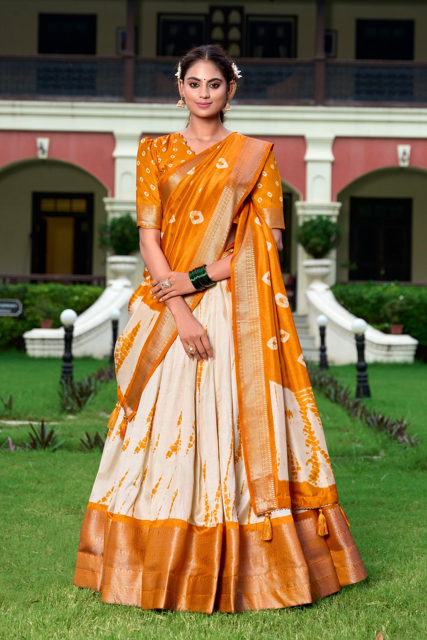 Lorenvalley Cream and Mustard Dola Silk Shibori Print With Zari Weaving Border Lehenga Choli | Swadesiicart