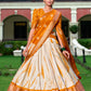 Lorenvalley Cream and Mustard Dola Silk Shibori Print With Zari Weaving Border Lehenga Choli | Swadesiicart