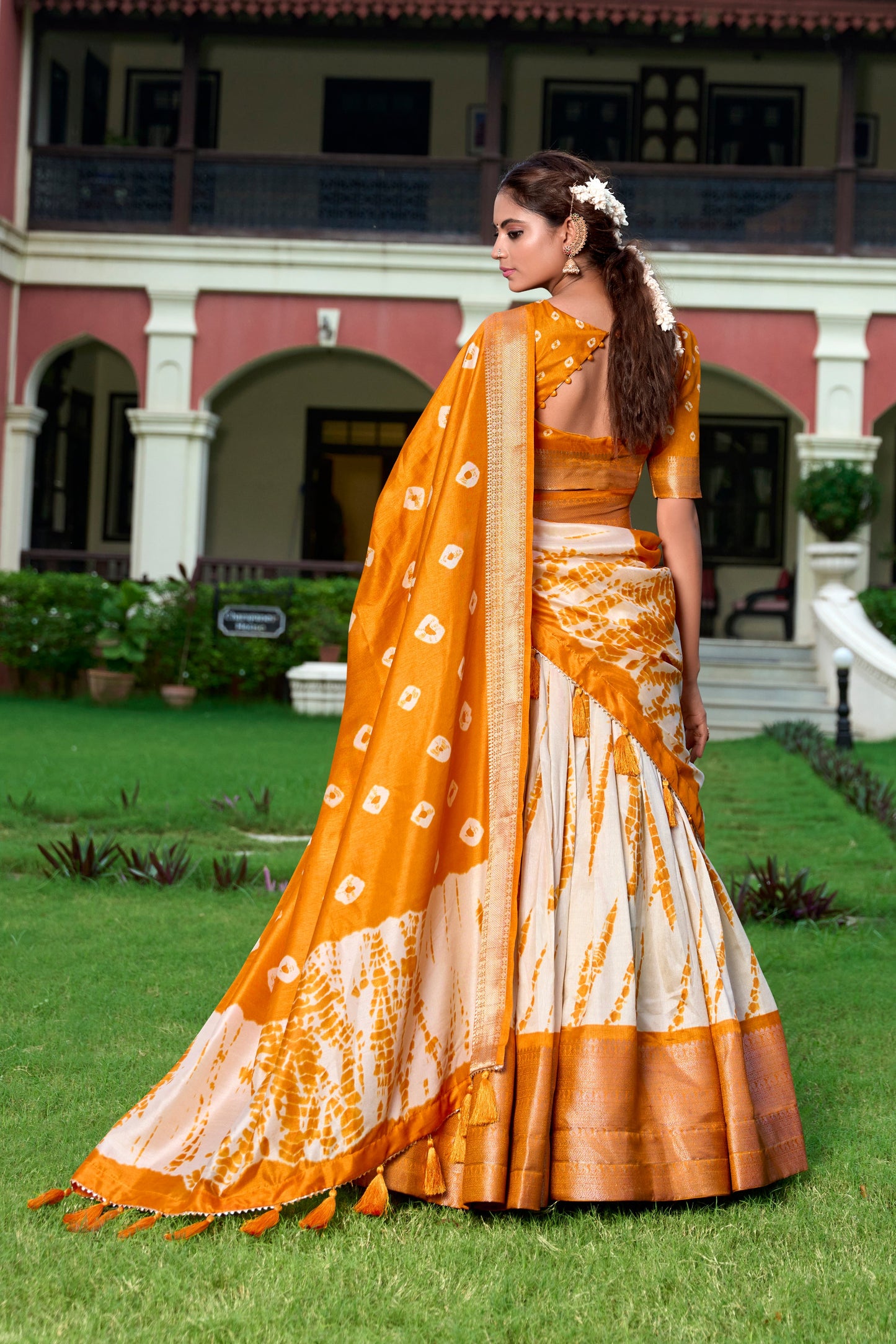 Lorenvalley Cream and Mustard Dola Silk Shibori Print With Zari Weaving Border Lehenga Choli | Swadesiicart