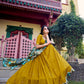 Lorenvalley Mustard Vichitra Silk Sequins and Thread Embroidery Work with Kalamkari Print Border Lehenga Choli with Dupatta | Swadesiicart