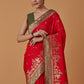 Monjolika Fashion Red Banarasi Silk Blend SareeWith Traditional & Modern Dulha Dulhan Figure Zari Woven Detailing | Swadesiicart