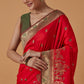 Monjolika Fashion Red Banarasi Silk Blend SareeWith Traditional & Modern Dulha Dulhan Figure Zari Woven Detailing | Swadesiicart