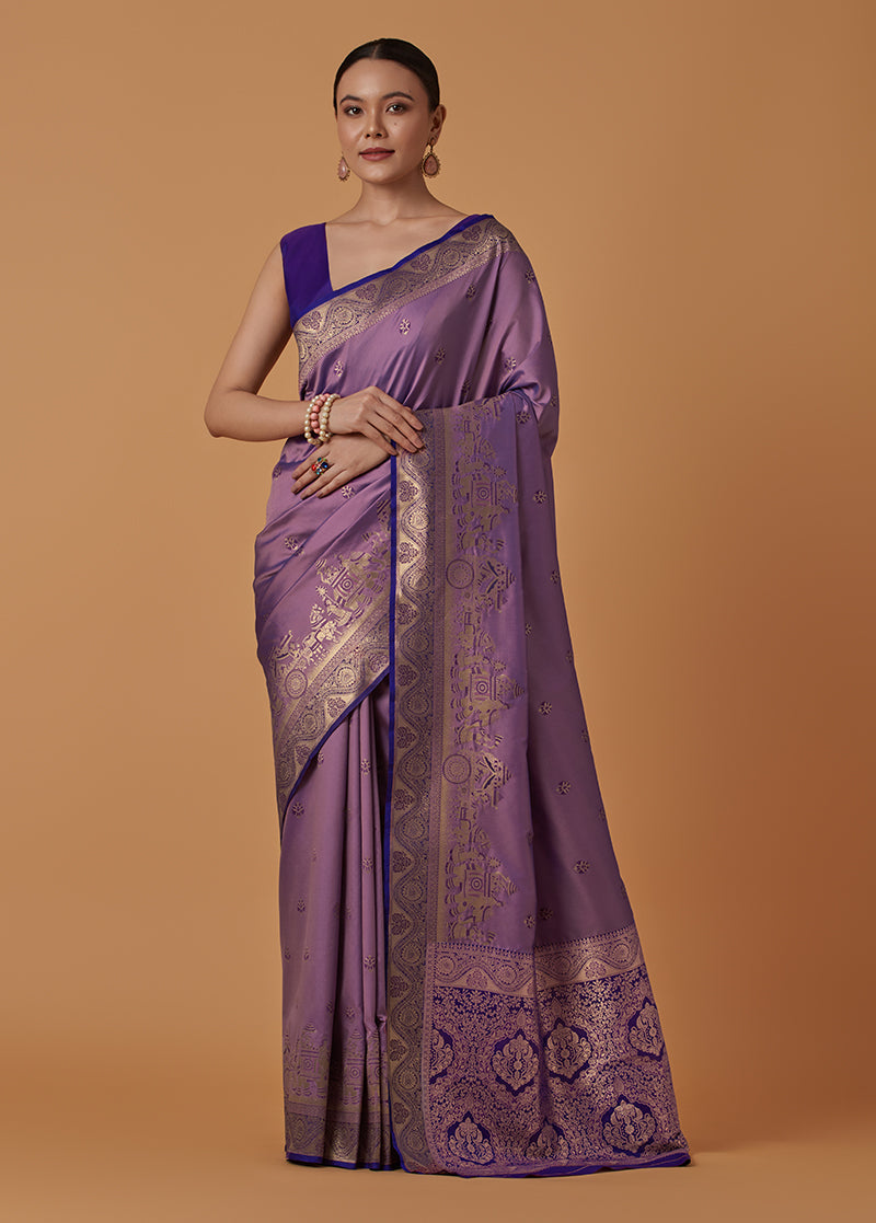 Monjolika Fashion Lavender Banarasi Silk Blend SareeWith Traditional & Modern Dulha Dulhan Figure Zari Woven Detailing | Swadesiicart