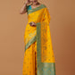 Monjolika Fashion Yellow Banarasi Silk Blend SareeWith Traditional & Modern Dulha Dulhan Figure Zari Woven Detailing | Swadesiicart