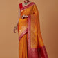 Monjolika Fashion Amber Banarasi Silk Blend SareeWith Traditional & Modern Dulha Dulhan Figure Zari Woven Detailing | Swadesiicart