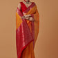 Monjolika Fashion Amber Banarasi Silk Blend SareeWith Traditional & Modern Dulha Dulhan Figure Zari Woven Detailing | Swadesiicart