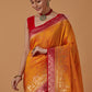 Monjolika Fashion Amber Banarasi Silk Blend SareeWith Traditional & Modern Dulha Dulhan Figure Zari Woven Detailing | Swadesiicart