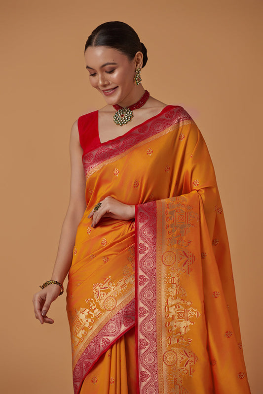 Monjolika Fashion Amber Banarasi Silk Blend SareeWith Traditional & Modern Dulha Dulhan Figure Zari Woven Detailing | Swadesiicart