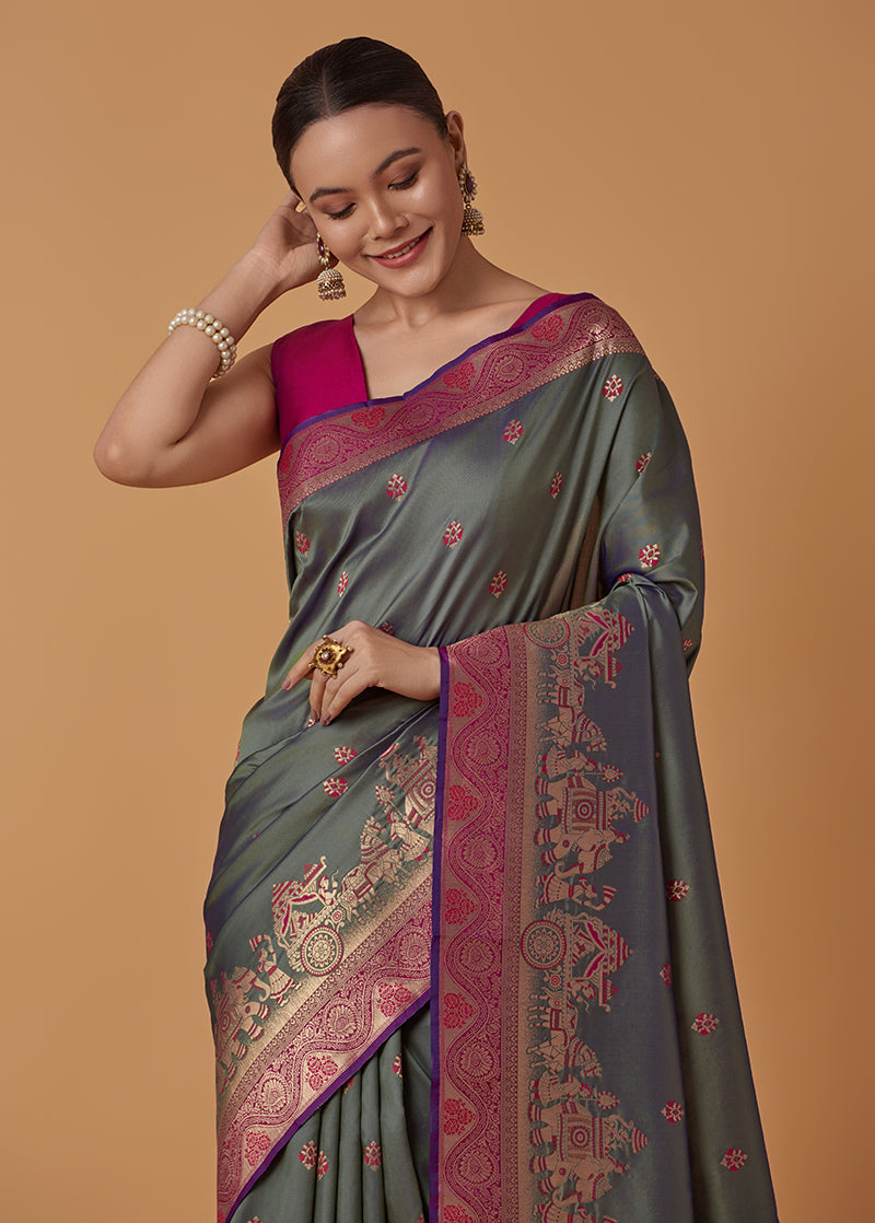 Monjolika Fashion Olive Banarasi Silk Blend SareeWith Traditional & Modern Dulha Dulhan Figure Zari Woven Detailing | Swadesiicart