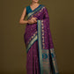Monjolika Fashion Dark Purple Banarasi Silk Blend SareeIn Classic Paisley & Rich Zari Pallu Comes With Unstitched Blouse | Swadesiicart