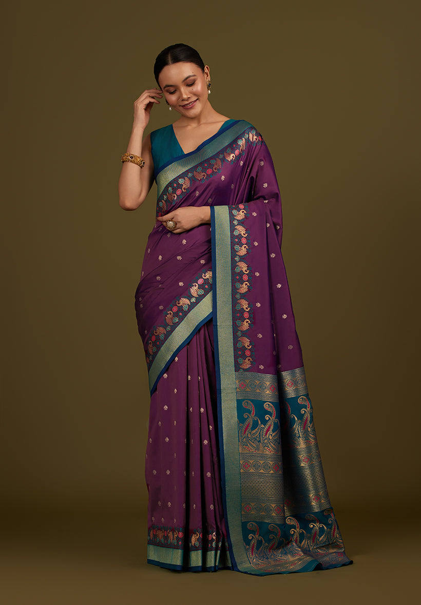 Monjolika Fashion Dark Purple Banarasi Silk Blend SareeIn Classic Paisley & Rich Zari Pallu Comes With Unstitched Blouse | Swadesiicart