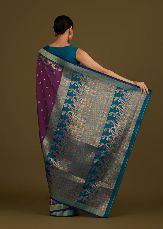 Monjolika Fashion Dark Purple Banarasi Silk Blend SareeIn Classic Paisley & Rich Zari Pallu Comes With Unstitched Blouse | Swadesiicart