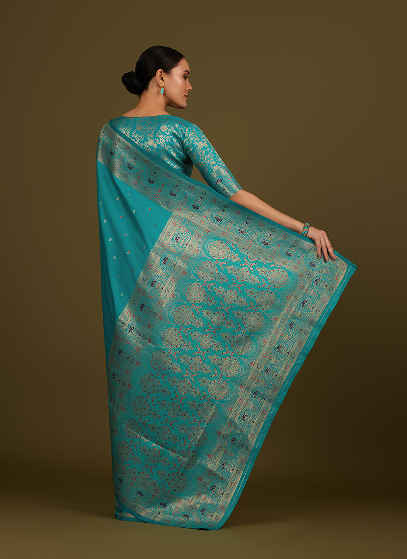 Monjolika Fashion Elegant Cyan Banarasi Silk Blend SareeBrocade Motifs & Zari Woven Splendor | Swadesiicart