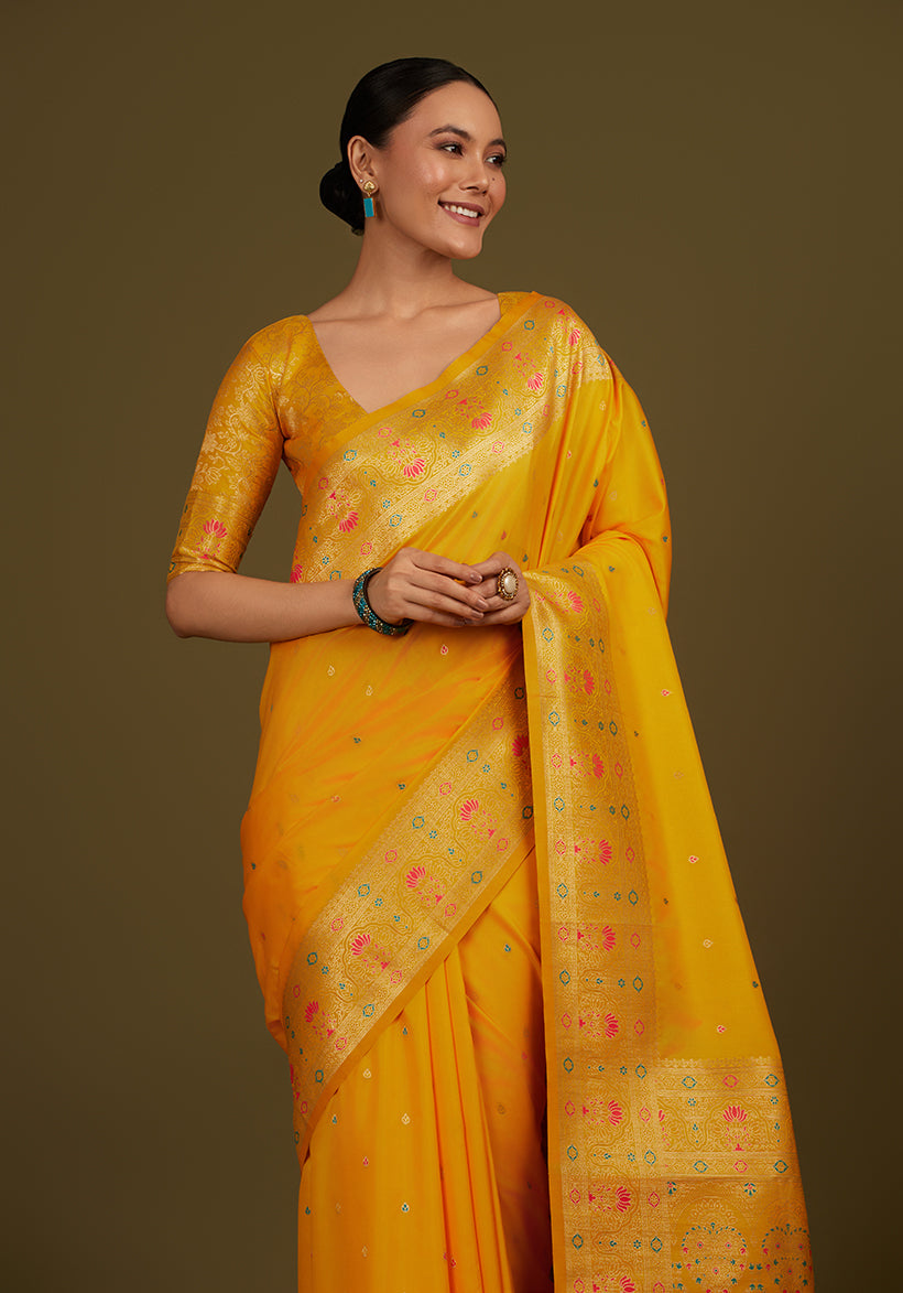 Monjolika Fashion Elegant Yellow Banarasi Silk Blend SareeBrocade Motifs & Zari Woven Splendor | Swadesiicart
