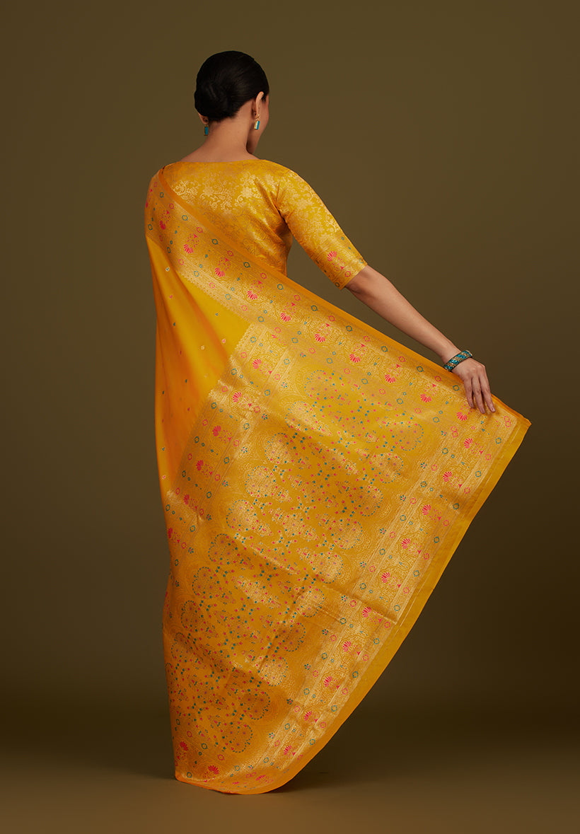 Monjolika Fashion Elegant Yellow Banarasi Silk Blend SareeBrocade Motifs & Zari Woven Splendor | Swadesiicart