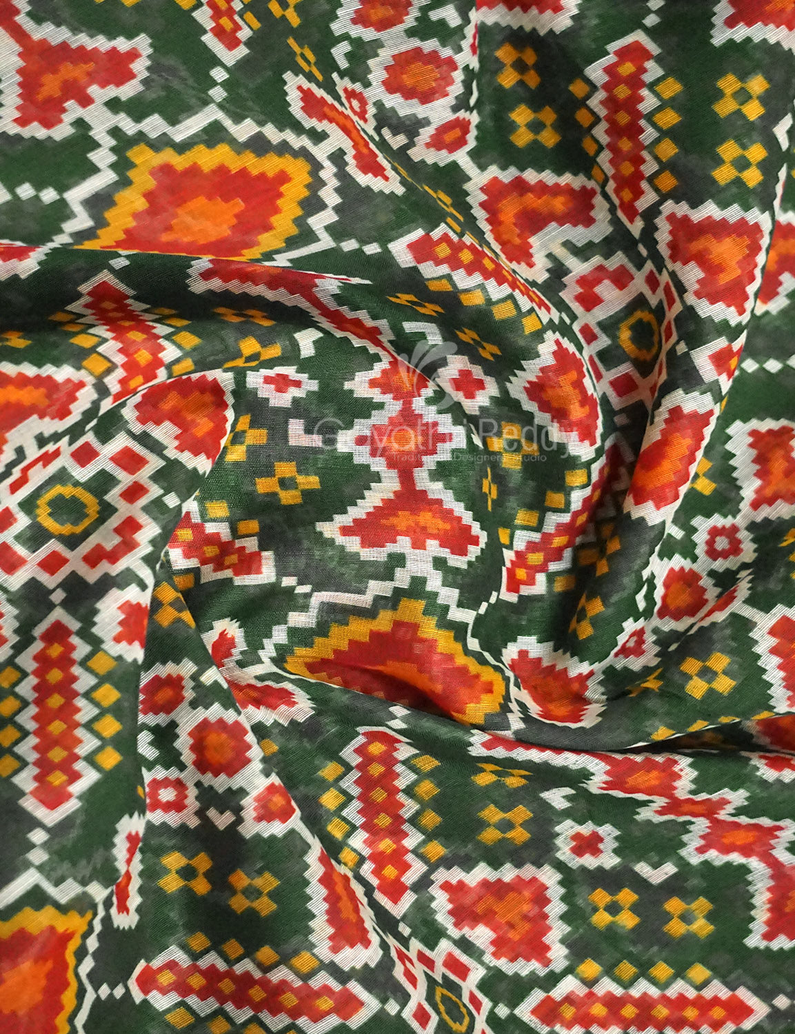 Shades of Navy Parrot Green Colour Patola Print Semi Chanderi Saree By Gayathri Reddy Designer Studio | Swadesiicart