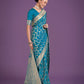 Monjolika Fashion Stunning Cyan blue Banarasi Satin Silk Golden Meenakari Work Saree | Swadesiicart
