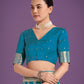 Monjolika Fashion Stunning Cyan blue Banarasi Satin Silk Golden Meenakari Work Saree | Swadesiicart