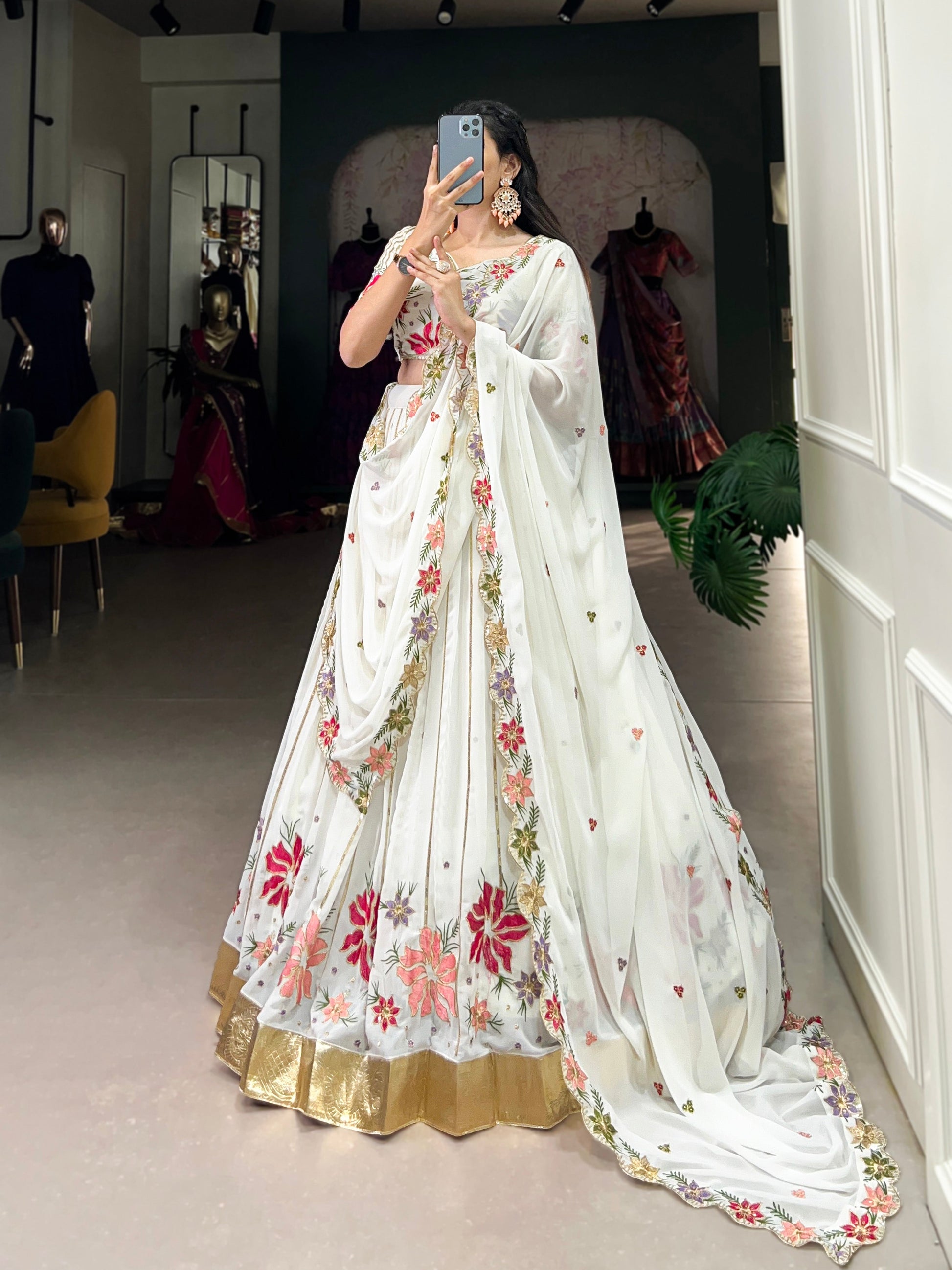 Lorenvalley White Georgette Sequins and Thread Embroidery Work with Embossed Design Lace Lehenga Choli | Swadesiicart