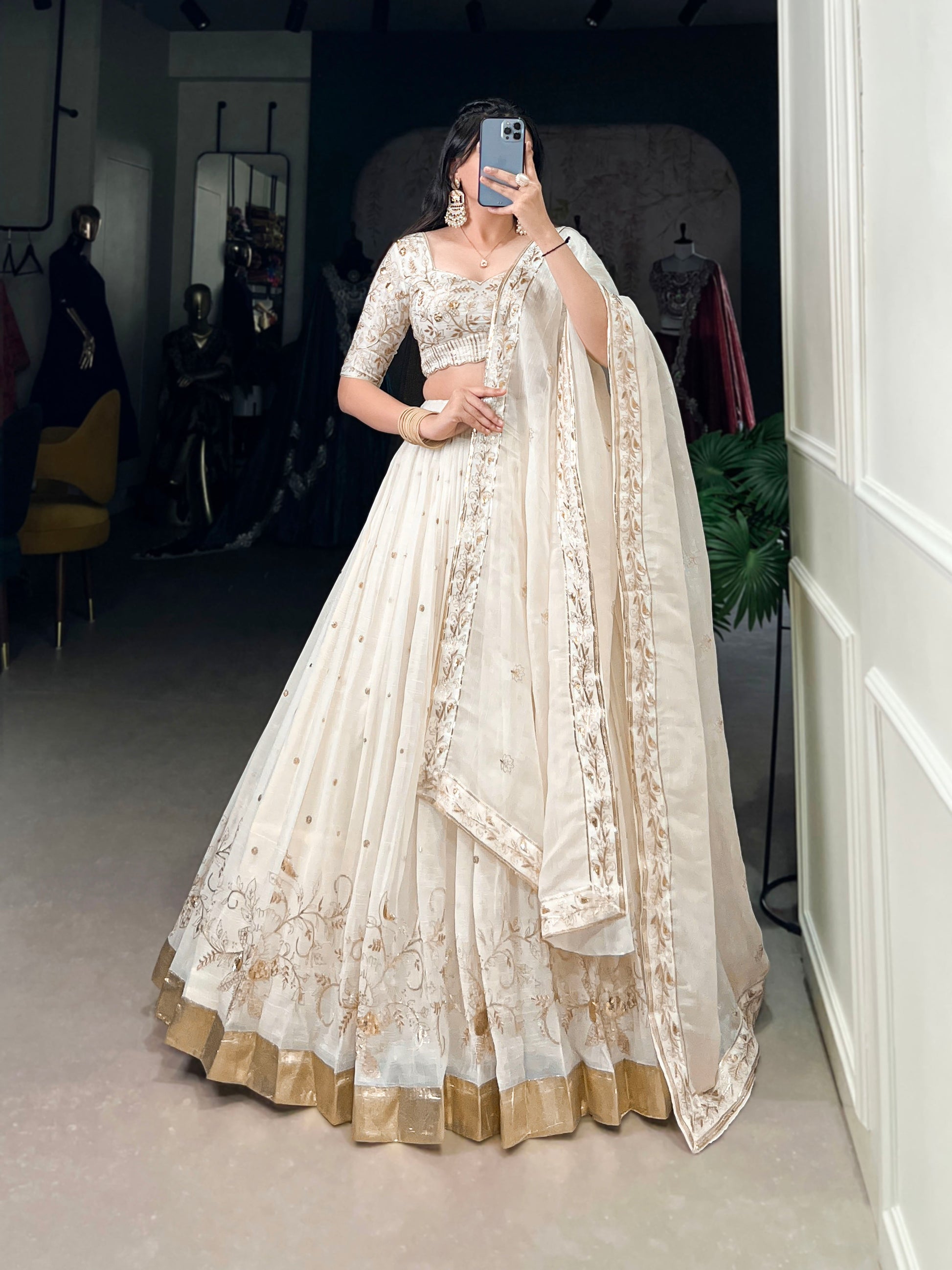 Lorenvalley Off White Silver Glosy Fabric with Sequins and Embroidery with Foil Work Lehenga Choli | Swadesiicart