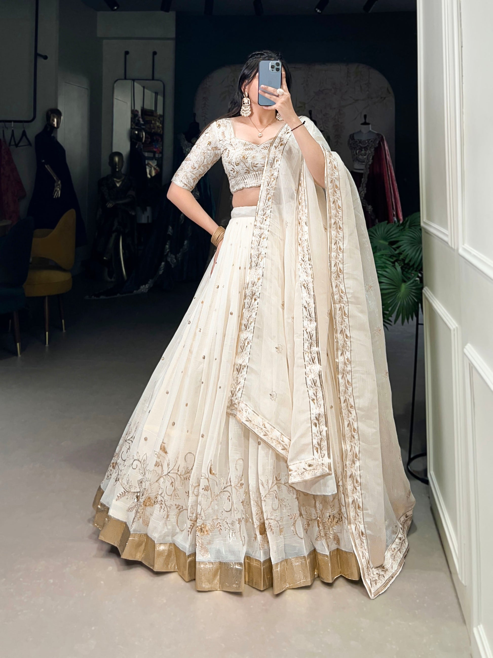 Lorenvalley Off White Silver Glosy Fabric with Sequins and Embroidery with Foil Work Lehenga Choli | Swadesiicart