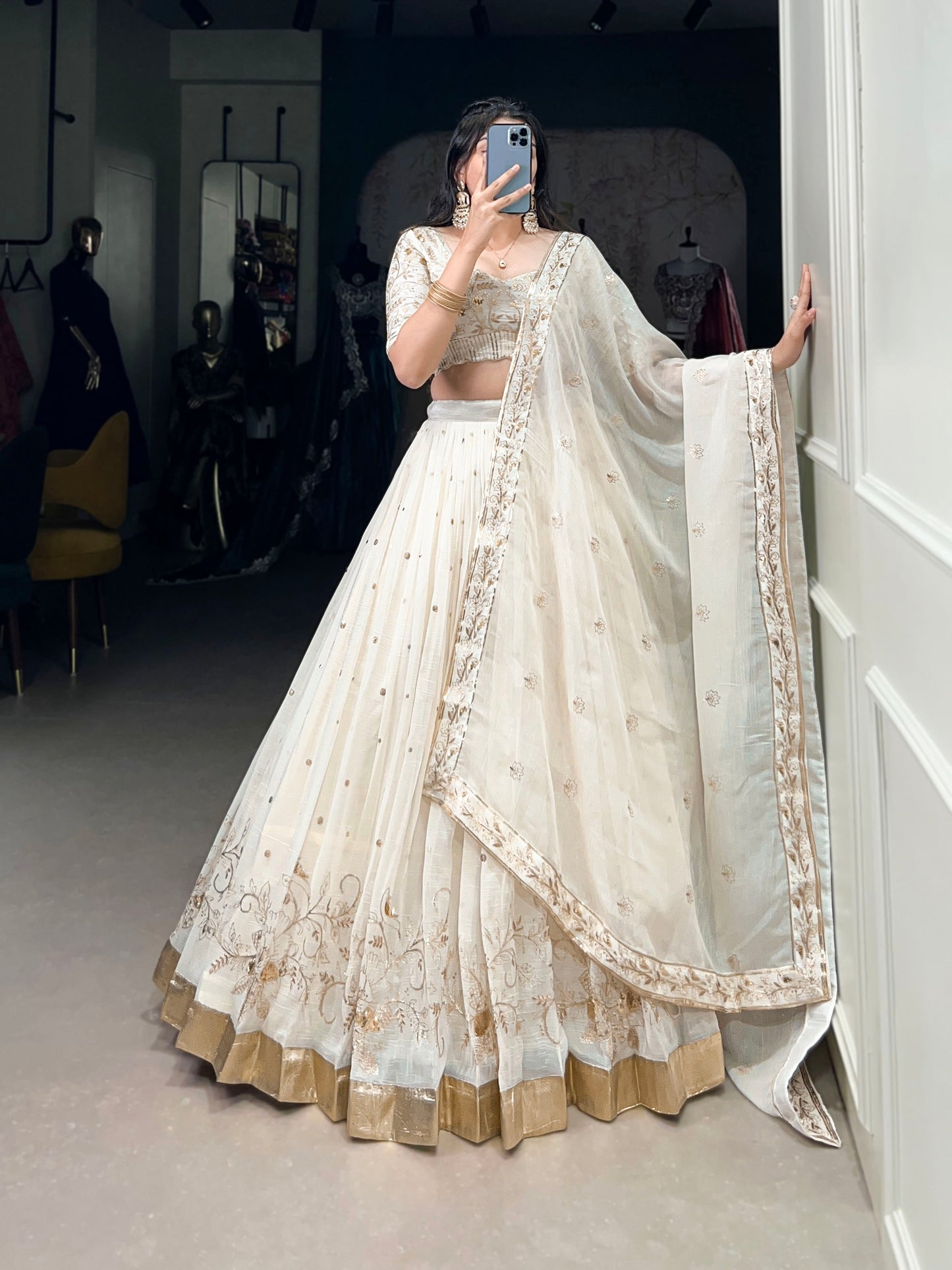 Lorenvalley Off White Silver Glosy Fabric with Sequins and Embroidery with Foil Work Lehenga Choli | Swadesiicart