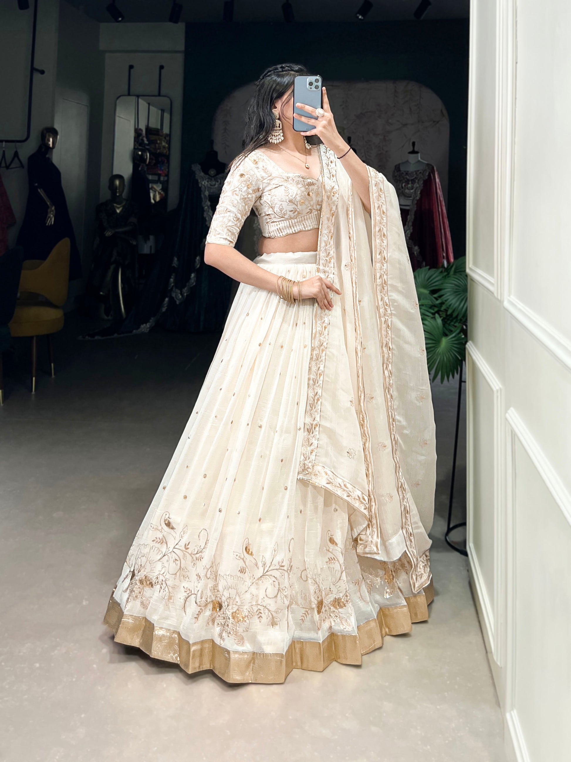 Lorenvalley Off White Silver Glosy Fabric with Sequins and Embroidery with Foil Work Lehenga Choli | Swadesiicart