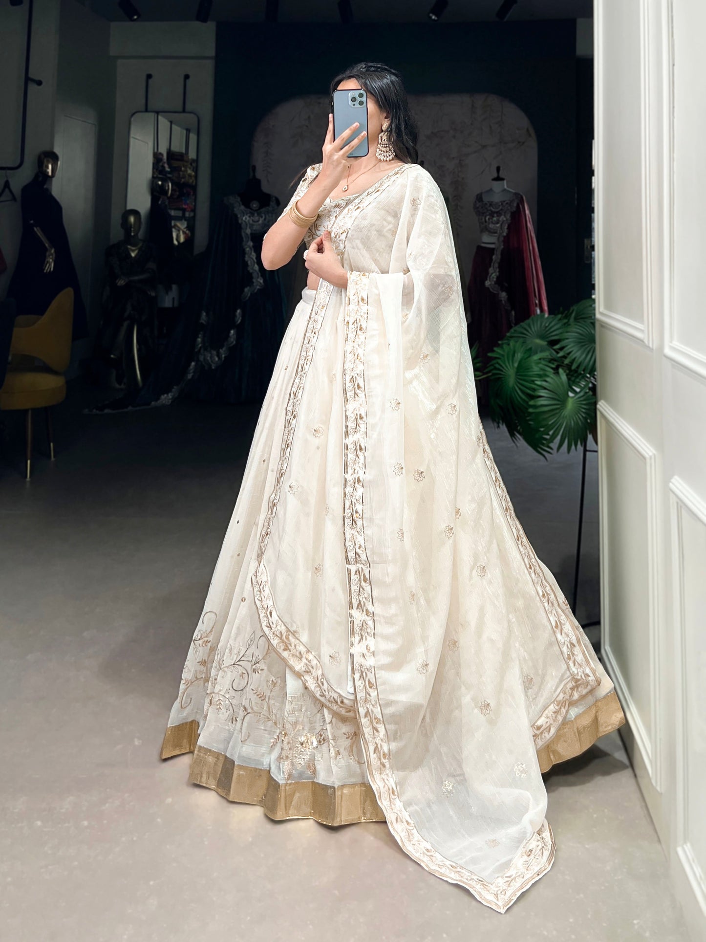 Lorenvalley Off White Silver Glosy Fabric with Sequins and Embroidery with Foil Work Lehenga Choli | Swadesiicart