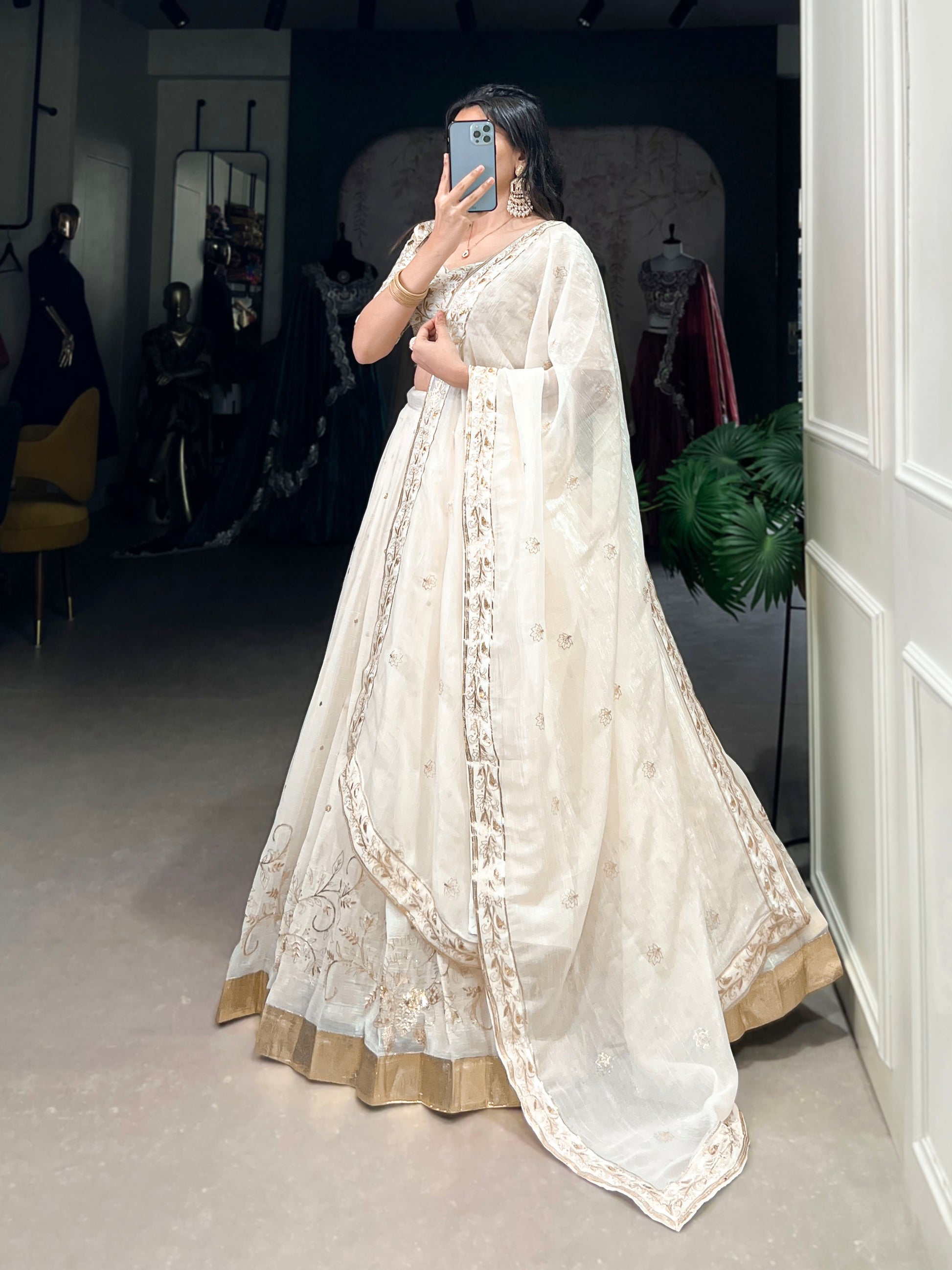 Lorenvalley Off White Silver Glosy Fabric with Sequins and Embroidery with Foil Work Lehenga Choli | Swadesiicart