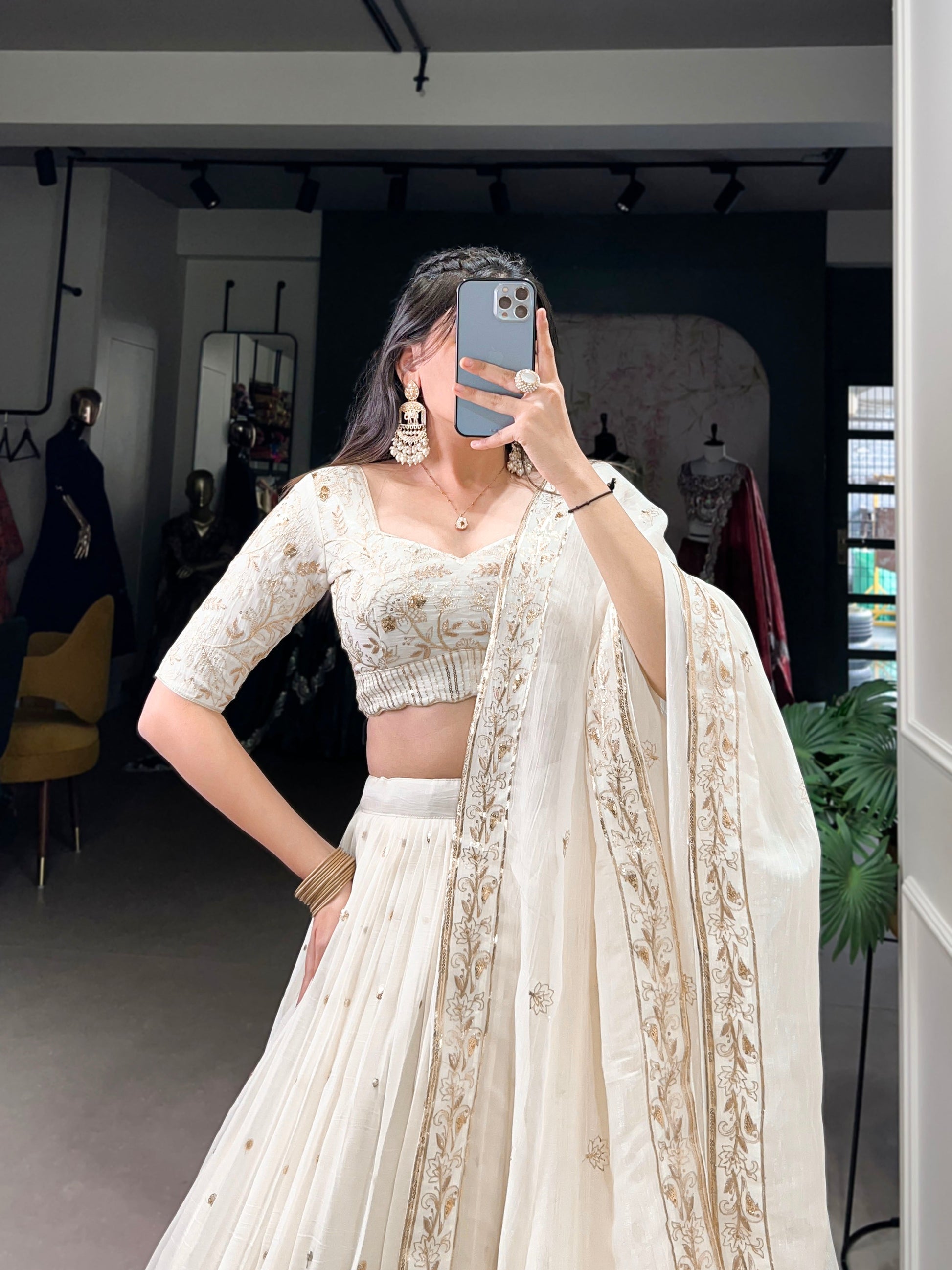 Lorenvalley Off White Silver Glosy Fabric with Sequins and Embroidery with Foil Work Lehenga Choli | Swadesiicart