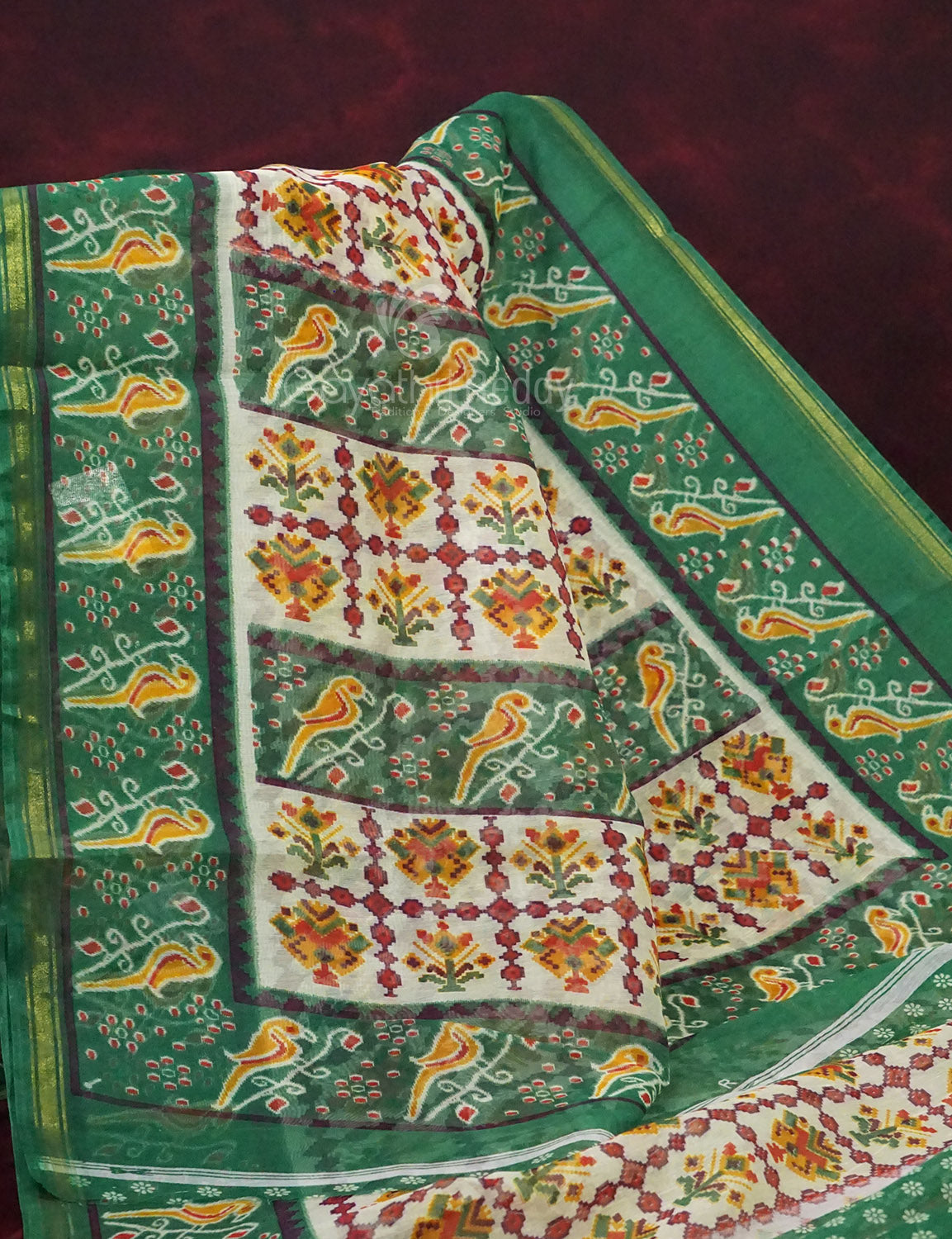 Shades of Off White And Mango Green Colour Patan Patola Semi Chanderi Saree By Gayathri Reddy Designer Studio | Swadesiicart