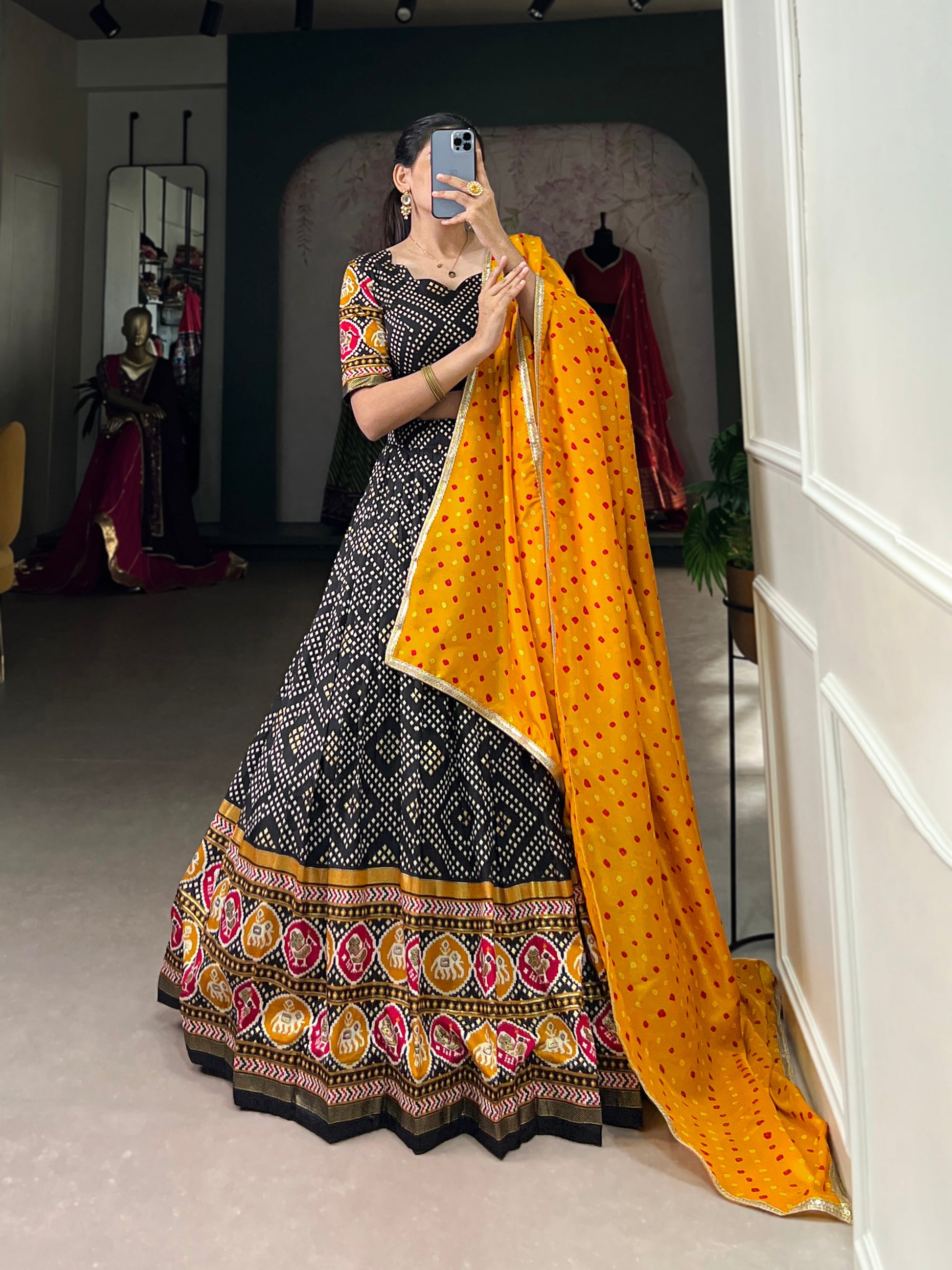 Lorenvalley Black Tussar Silk Bandhej and Patola Print with Foil Work Lehenga Choli with Dupatta | Swadesiicart