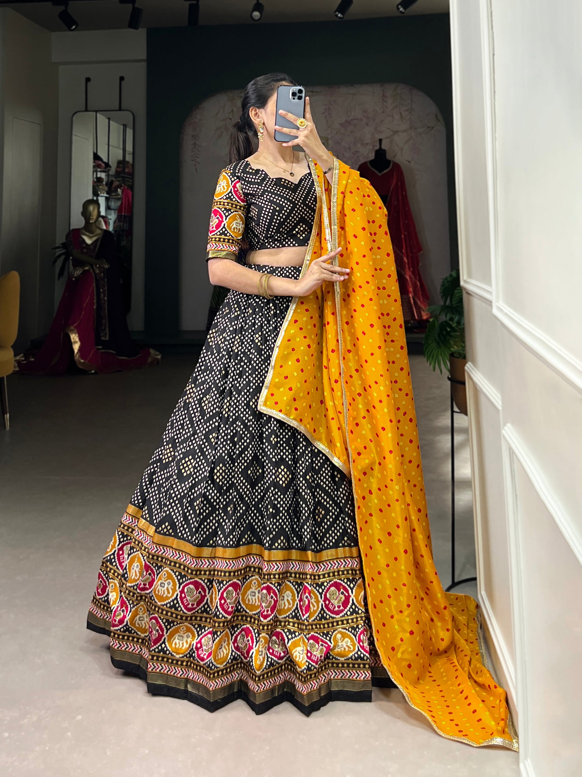 Lorenvalley Black Tussar Silk Bandhej and Patola Print with Foil Work Lehenga Choli with Dupatta | Swadesiicart