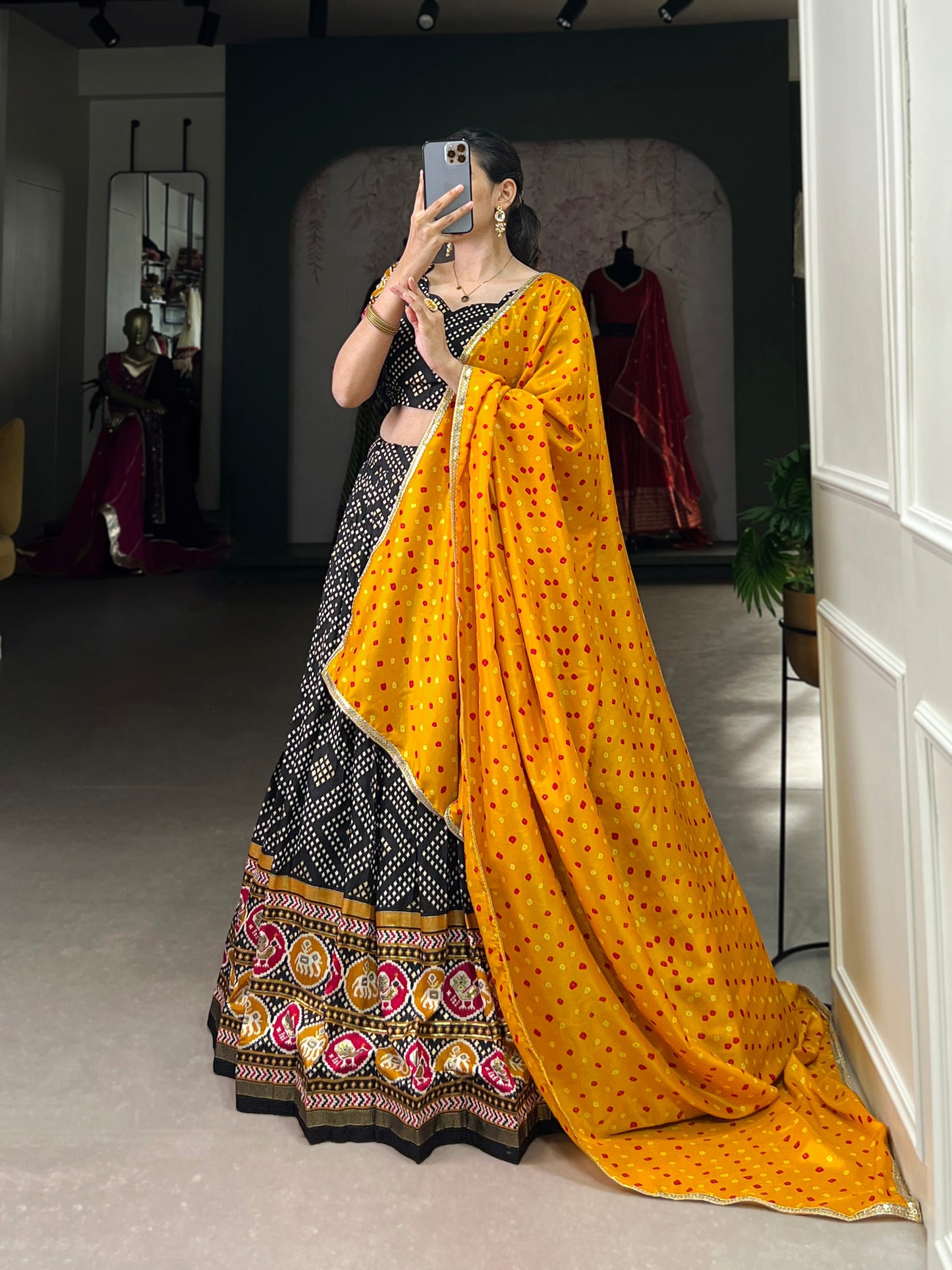 Lorenvalley Black Tussar Silk Bandhej and Patola Print with Foil Work Lehenga Choli with Dupatta | Swadesiicart