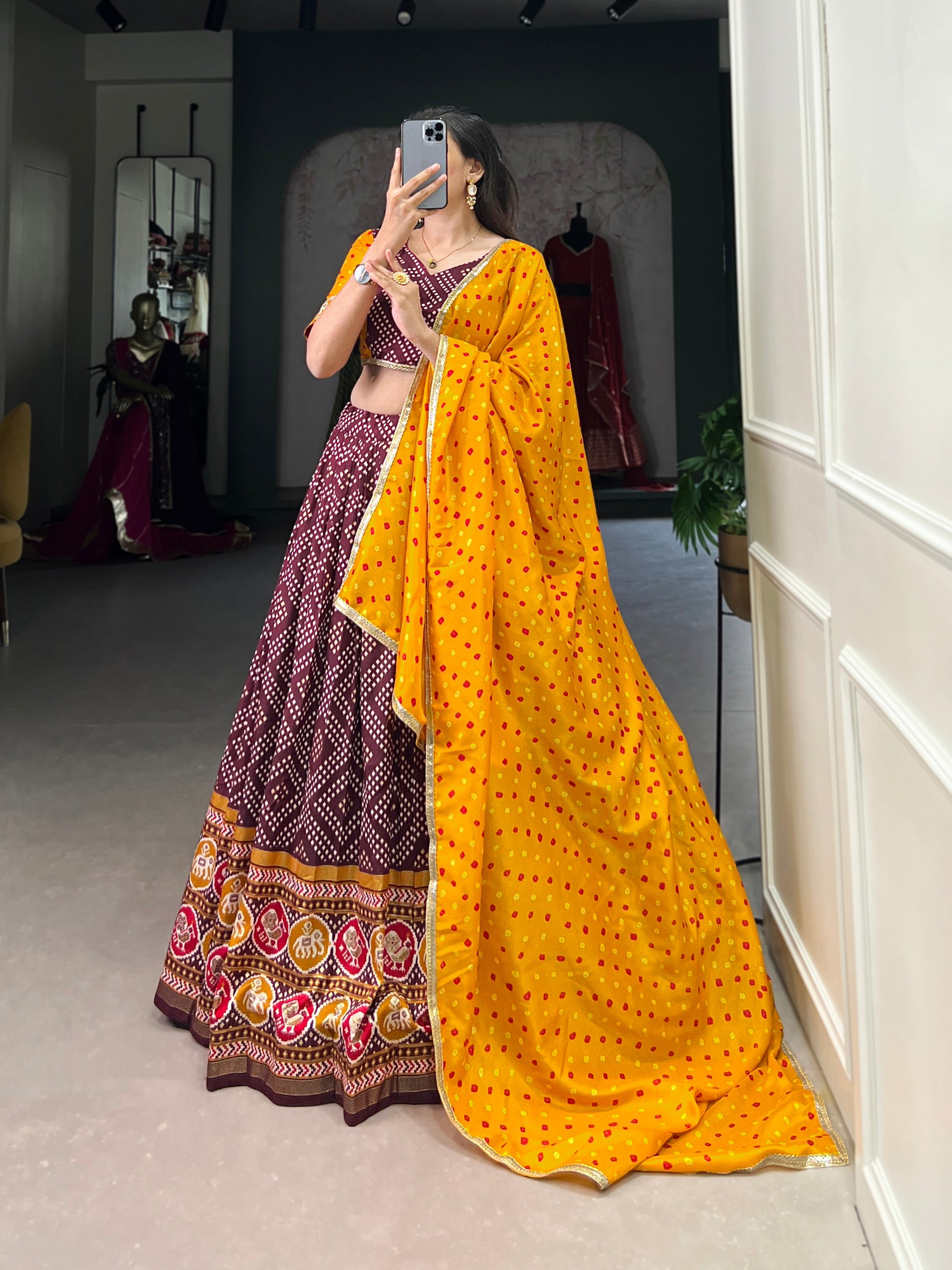 Lorenvalley Wine Tussar Silk Bandhej and Patola Print with Foil Work Lehenga Choli with Dupatta | Swadesiicart