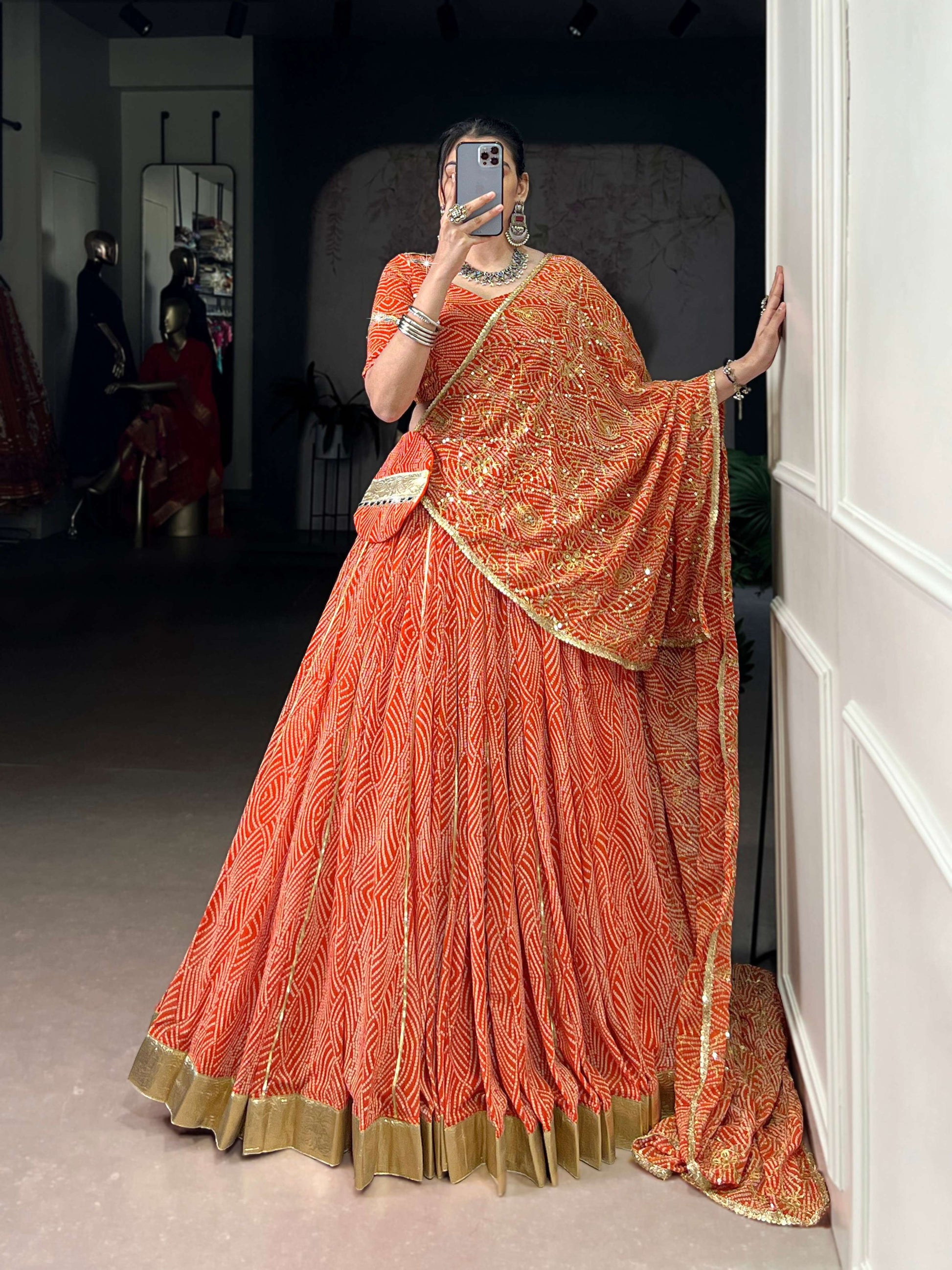 Lorenvalley Fashion Orange Georgette Bandhej Print and Embossed Design Lace with Gota Patti Touch Up Lehenga Choli with Dupatta - Swadesiicart
