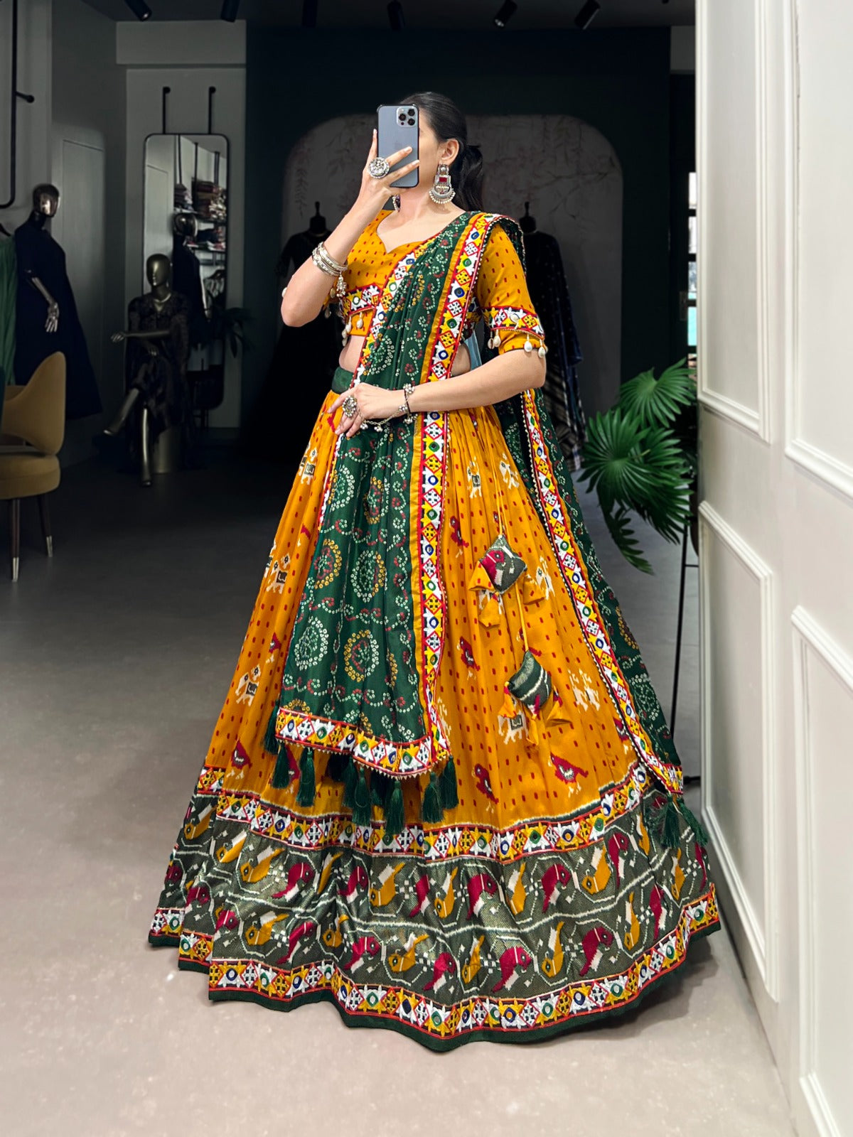 Lorenvalley Mustard Tussar Silk Patola Print with Gamthi Work Lace and Foil Work Lehenga Choli with Dupatta | Swadesiicart