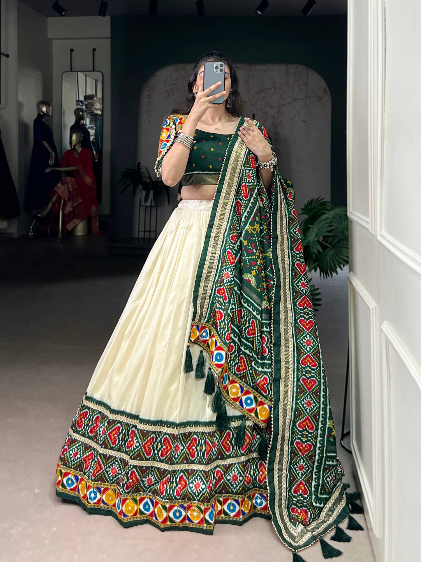 Lorenvalley Fashion Offwhite Tasar Silk Patola Print With Foil Work And Real Mirror Gamthi Work With Lace Touch Up Lehenga Choli with Dupatta | Swadesiicart