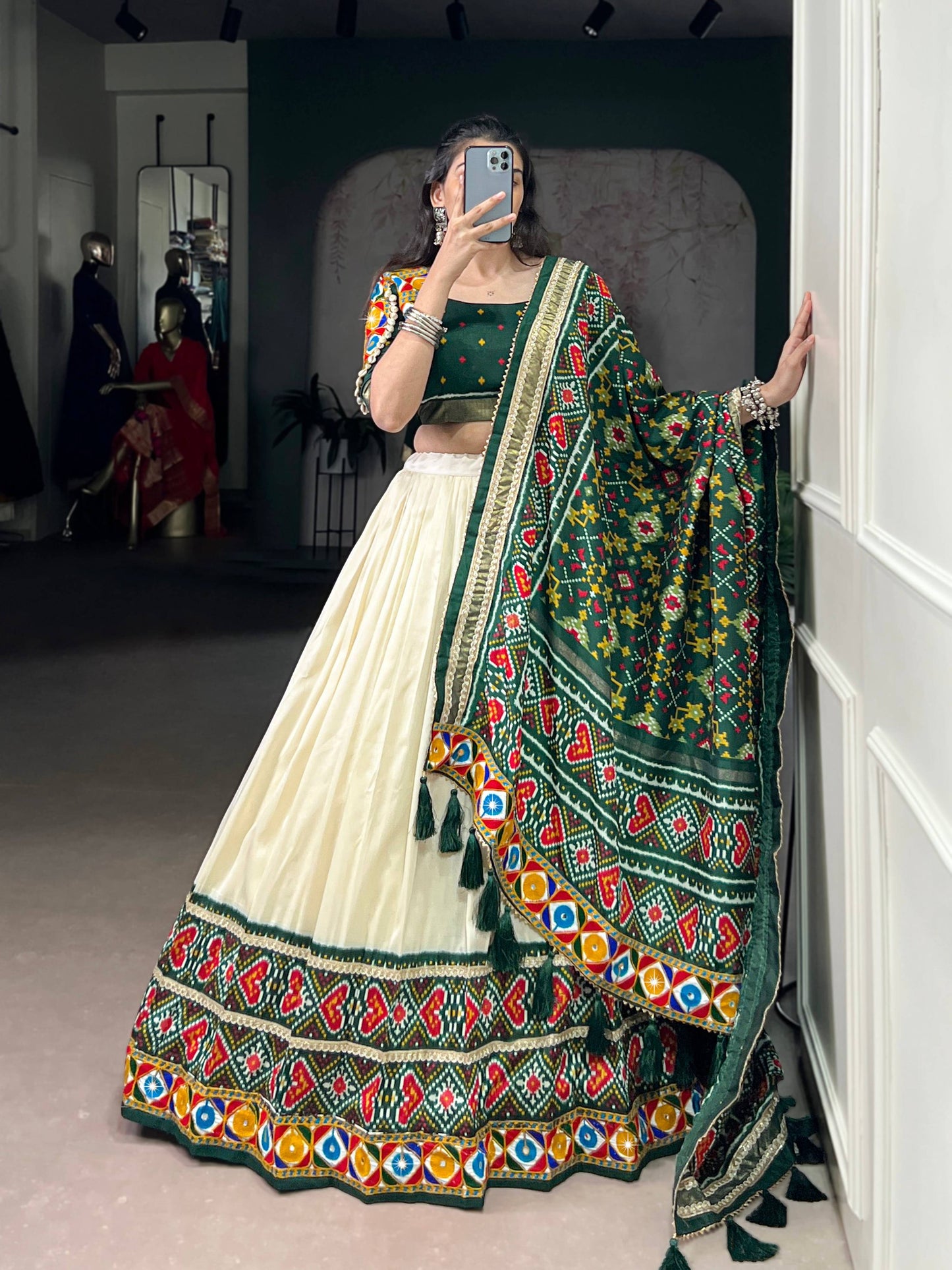 Lorenvalley Fashion Offwhite Tasar Silk Patola Print With Foil Work And Real Mirror Gamthi Work With Lace Touch Up Lehenga Choli with Dupatta | Swadesiicart