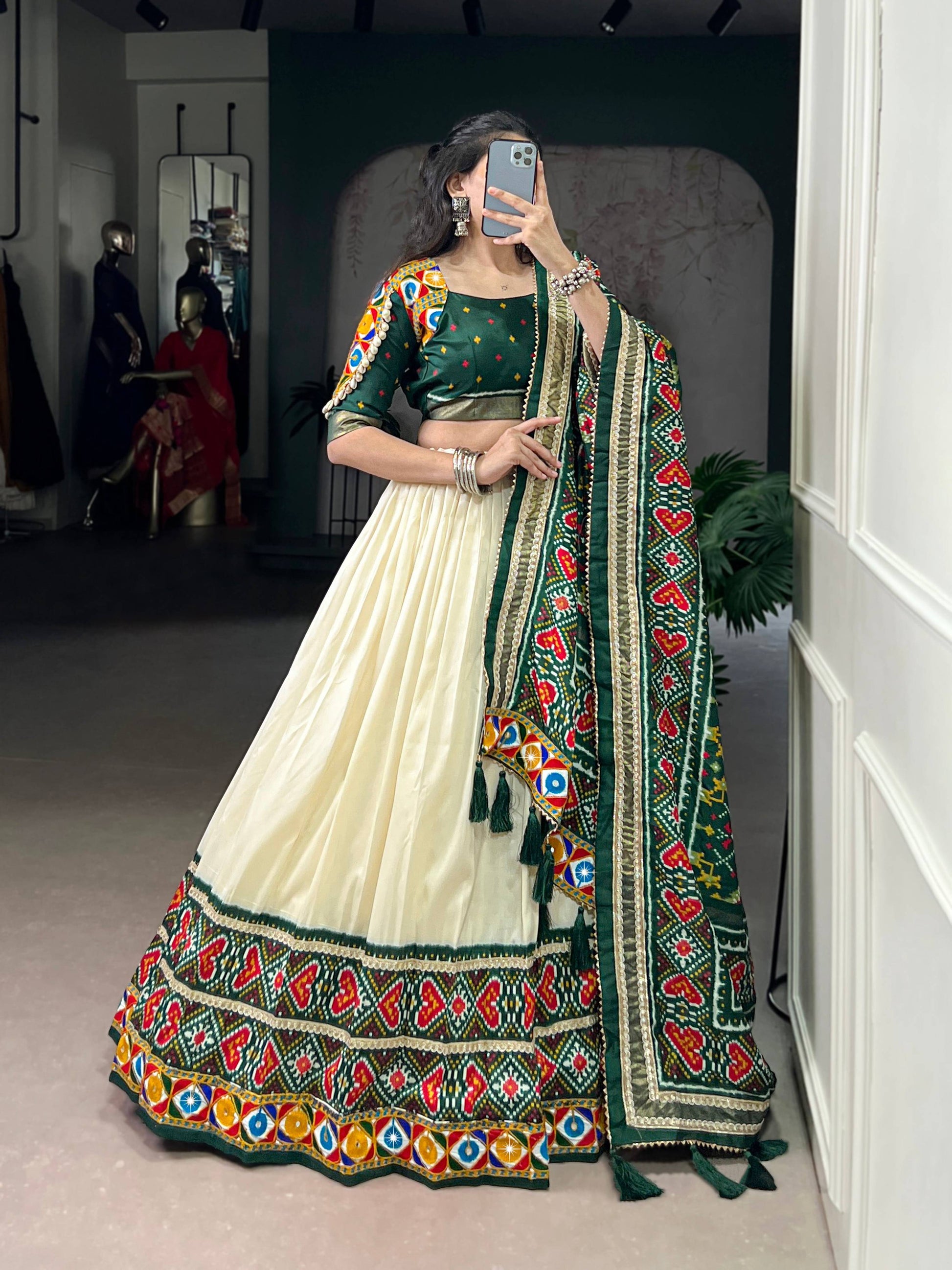 Lorenvalley Fashion Offwhite Tasar Silk Patola Print With Foil Work And Real Mirror Gamthi Work With Lace Touch Up Lehenga Choli with Dupatta | Swadesiicart