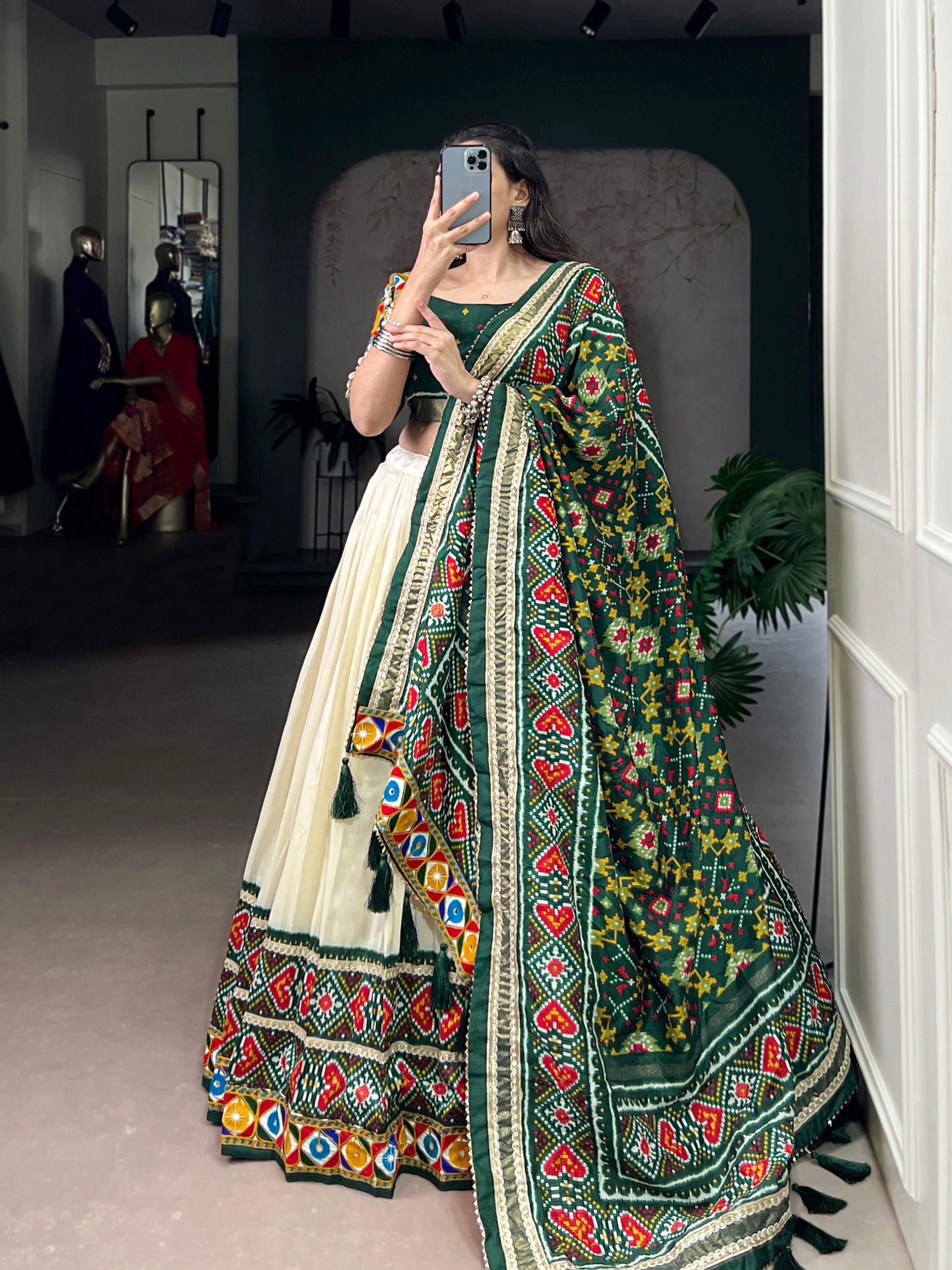 Lorenvalley Fashion Offwhite Tasar Silk Patola Print With Foil Work And Real Mirror Gamthi Work With Lace Touch Up Lehenga Choli with Dupatta | Swadesiicart